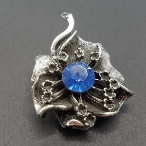 Vintage Flower Brooch, Silver Tone, Large Blue Rhinestone, Black Enamel, 1 7/8"